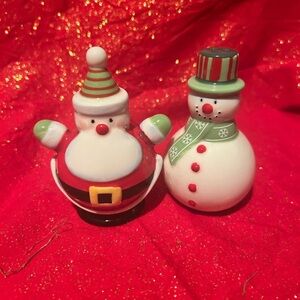 Festive Santa and Snowman Holiday salt and pepper shakers- 3 1/2” tall preloved